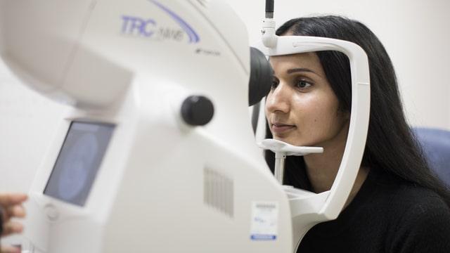 A person living with diabetes getting their eyes screened to check for diabetes complications